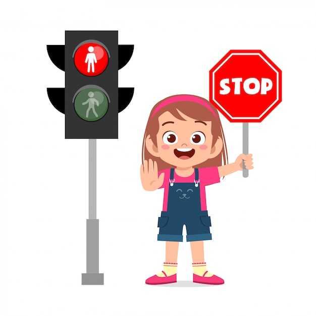 Happy cute kid girl with traffic sign