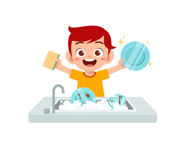 Happy cute little boy washing dish in the kitchen