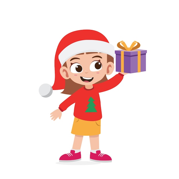 Happy cute little girl holding present for christmas