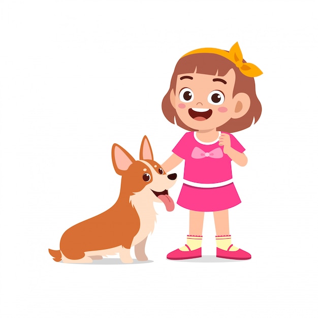Счастливый милый маленький ребенок мальчик девочка играет с собакой