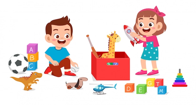 Happy cute little kid boy and girl playing with toys