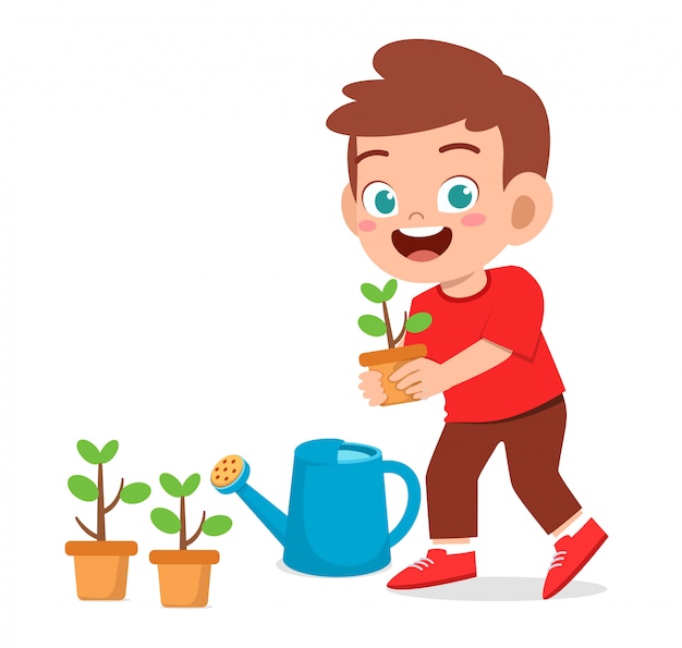 Happy cute little kid boy plant tree in garden