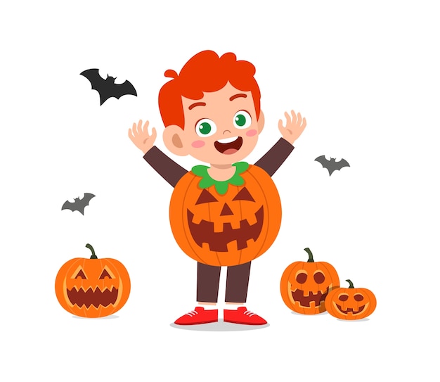 Happy cute little kid celebrate halloween wears pumpkin monster costume