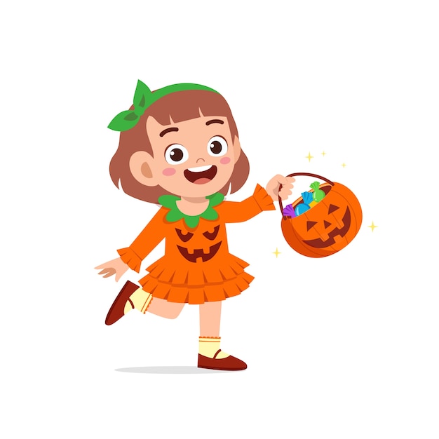 Happy cute little kid celebrate halloween wears pumpkin monster costume