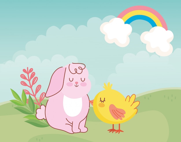 Happy easter, cute rabbit and chicken sitting in meadow