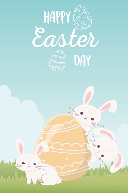 Vector happy easter day, schattige konijnen met beschilderde ei in gras decoratie
