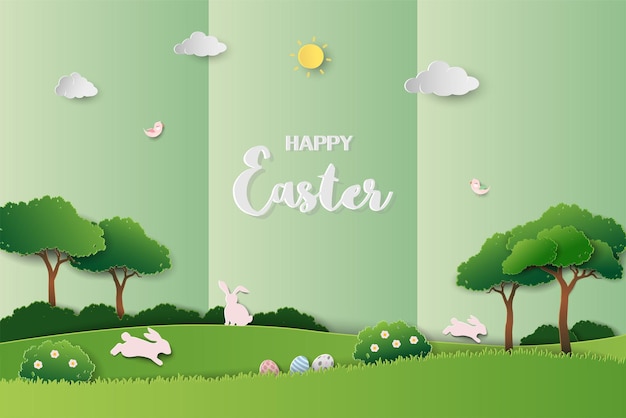 Happy easter greeting card on green paper craft background with rabbits jumping on grass