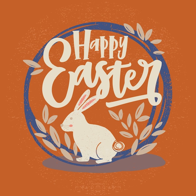 Happy easter inscription or holiday wish written with cursive font and bunny inside round frame or wreath decorated by leaves on orange background. hand drawn   illustration