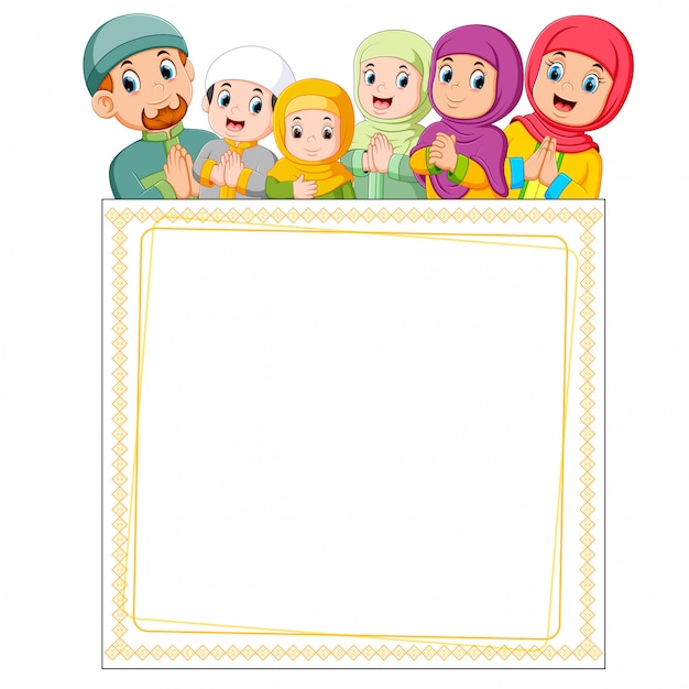 The happy family is giving the greeting of ied mubarak on the top of blank frame