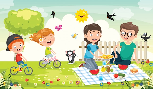 Famiglia felice che fa picnic alla natura