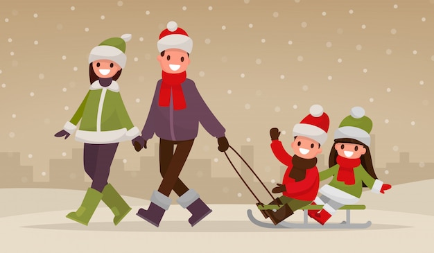 Famiglia felice che cammina all'aperto in inverno. i genitori trasportano i bambini su una slitta.