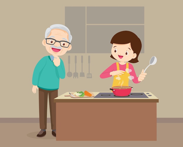 Famiglia felice con il nonno e la madre che cucinano in cucina, donna dall'aspetto anziana che cucina