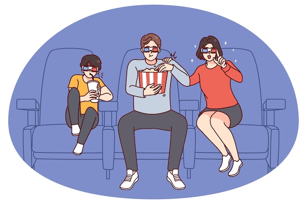 Счастливая семья с ребенком смотрит фильм в кинотеатре