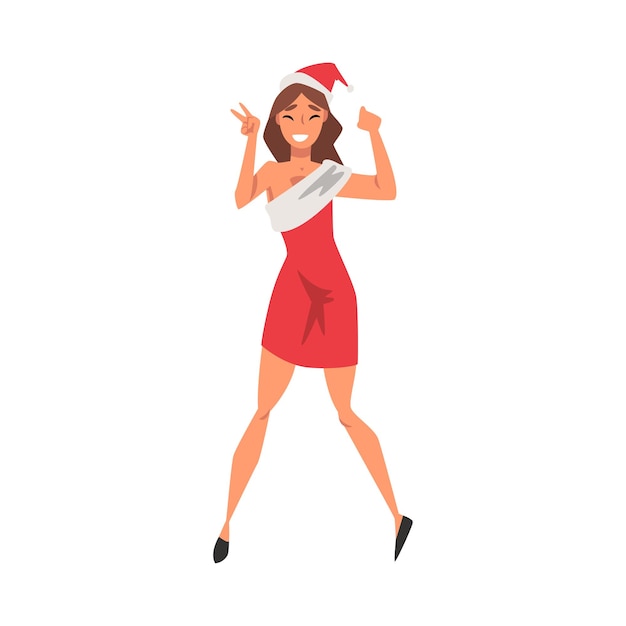 Vettore ragazza felice che celebra il natale indossando un vestito rosso di babbo natale e un cappello illustrazione vettoriale