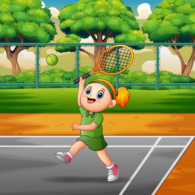 Happy girl playing tennis at the courts