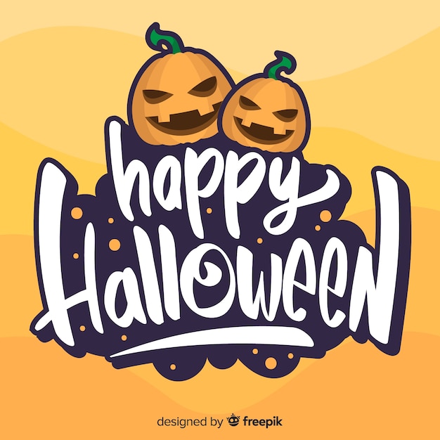 Happy halloween belettering met boze pompoenen