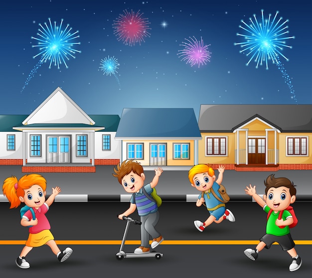 Happy kids playing in the street of a suburban neighborhood