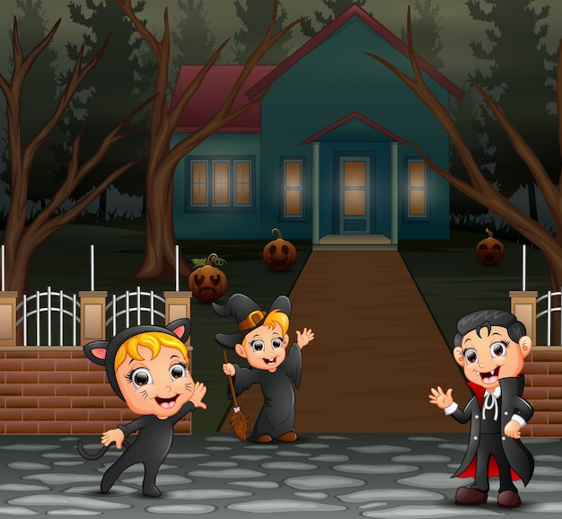 Vector happy kids wearing halloween costume on the page home