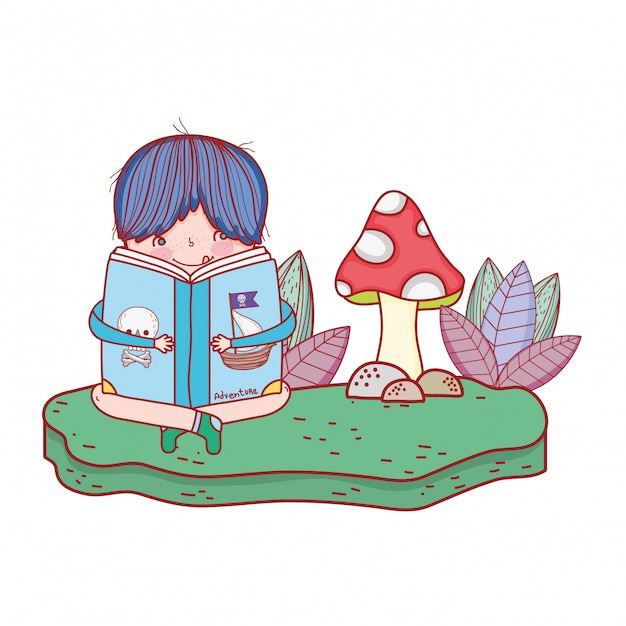 Happy little boy reading book in the landscape