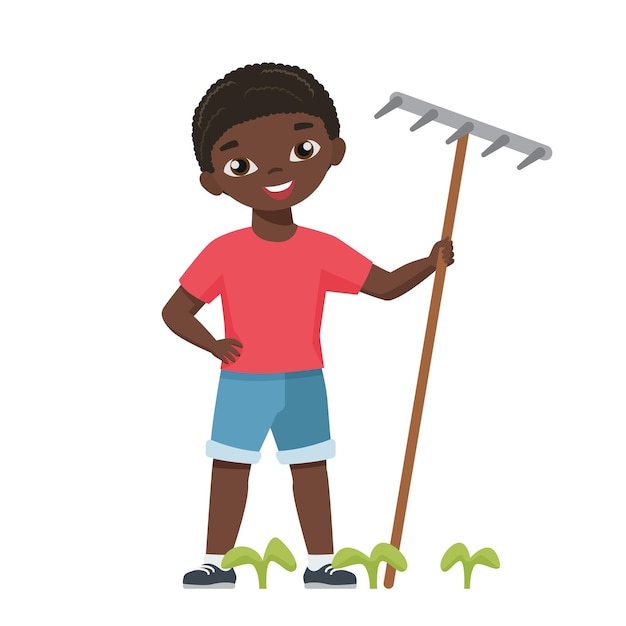 Happy little boy with garden rake