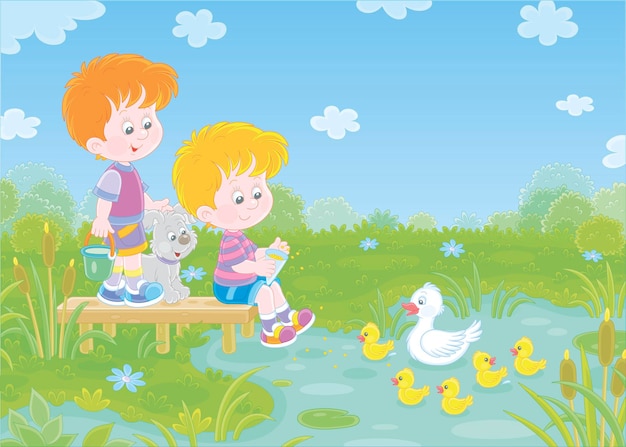 Happy little boys with a merry pup feeding small ducklings and a white duck swimming on a lake