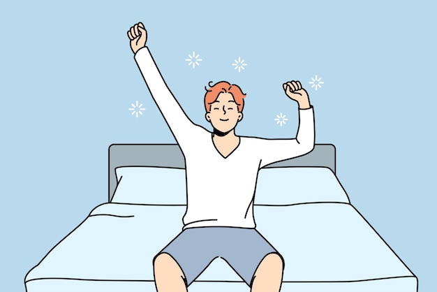 Happy man stretch in bed