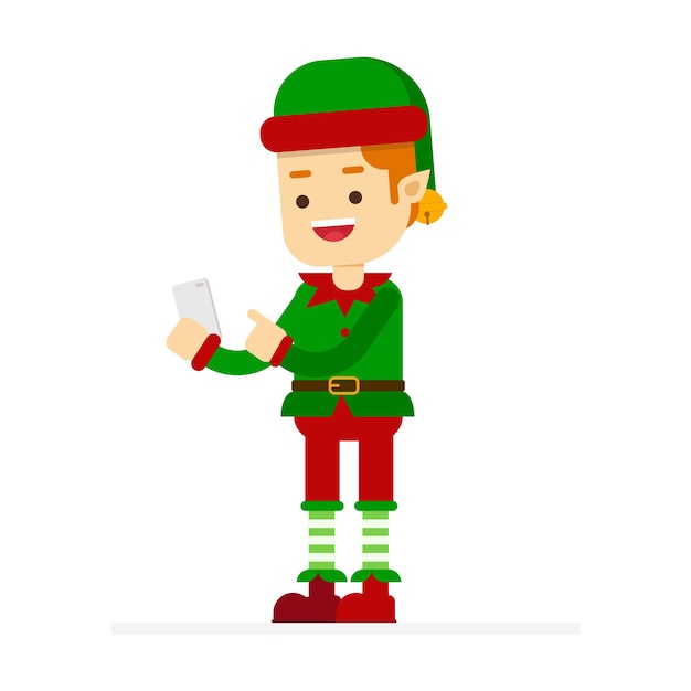 счастливый веселый символ рождественского эльфа, с телефоном в руке