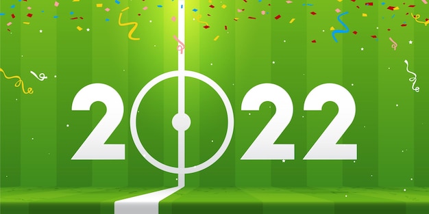 Happy New Year 2022 banner with soccer ball and paper confetti on soccer field background