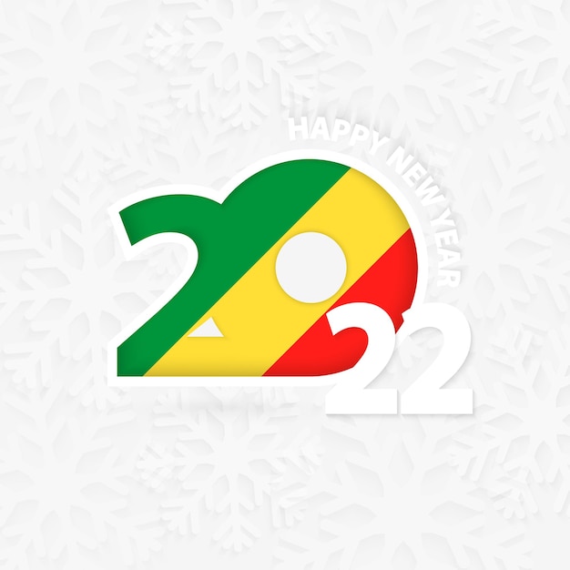 雪の結晶の背景にコンゴの新年あけましておめでとうございます2022。
