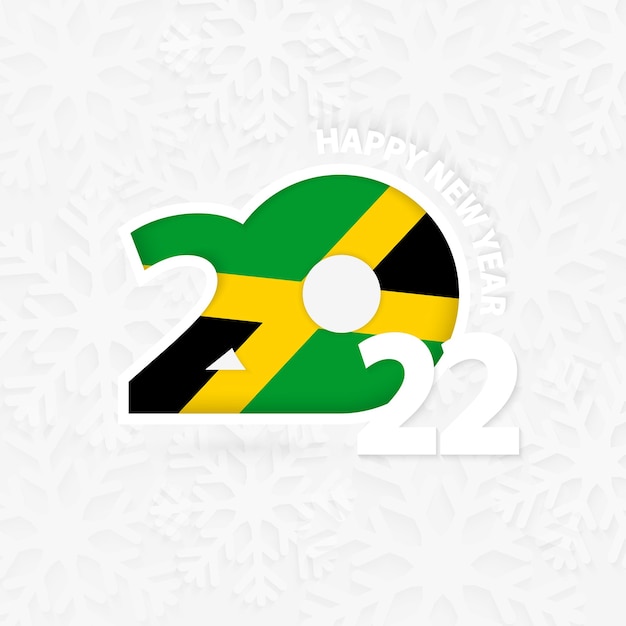 雪の結晶の背景にジャマイカの新年あけましておめでとうございます2022。