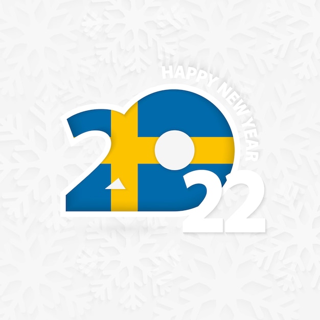 雪の結晶の背景にスウェーデンの新年あけましておめでとうございます2022。