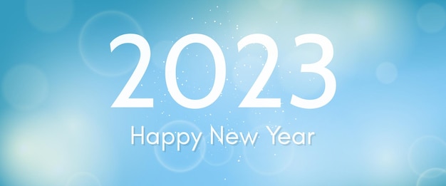 Happy new year 2023 incription on blurred background