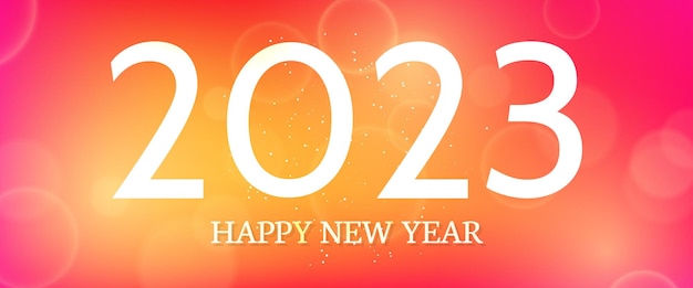 Happy new year 2023 incription on blurred background