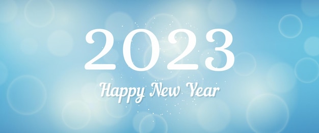 Happy new year 2023 incription on blurred background