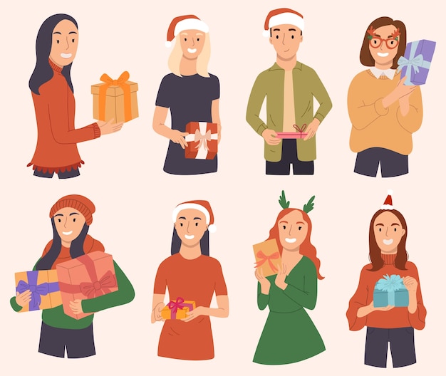 Happy people in Christmas costumes are holding gifts