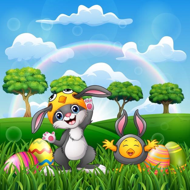 Happy rabbit and chicken cartoon in costume with easter egg