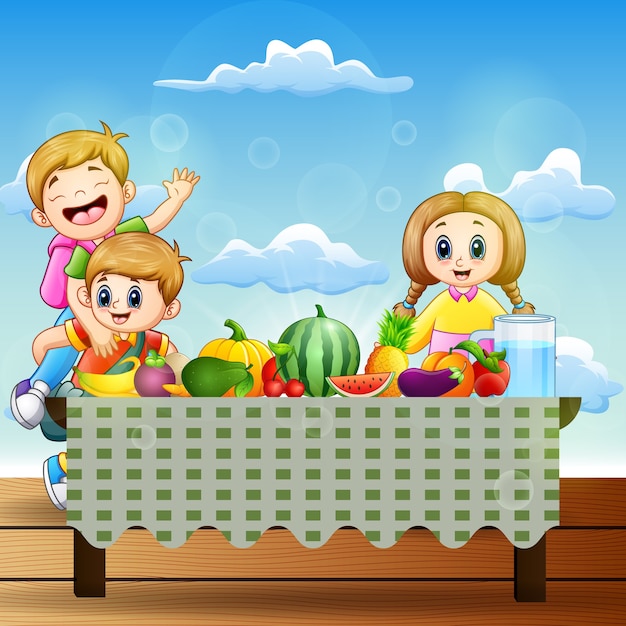 Happy two children with dishes of many kinds of fruits