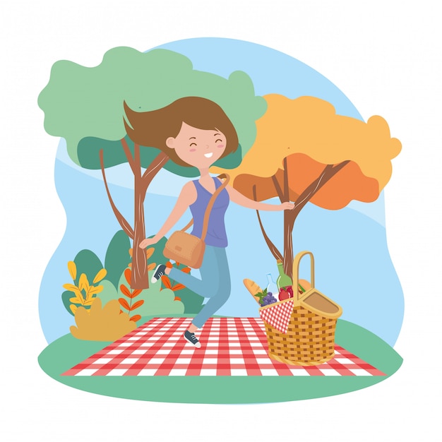 Happy woman basket blanket picnic nature