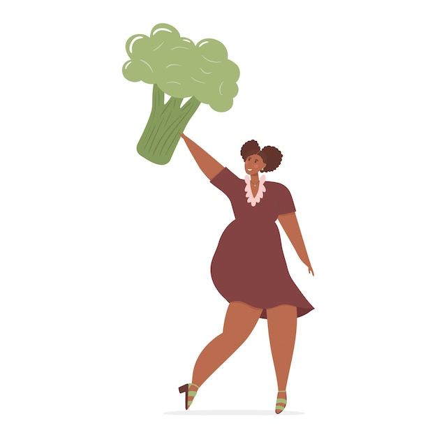 Happy woman holding giant broccoli over her head healthy diet and healthy lifestyle concept