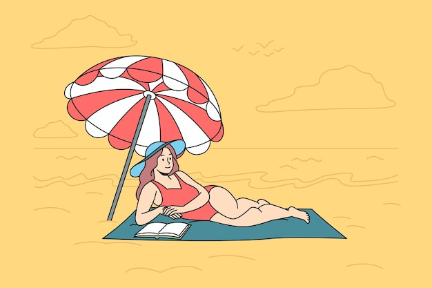 ビーチで横になっている水着の幸せな女性