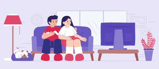 Happy Young couple watching television at home