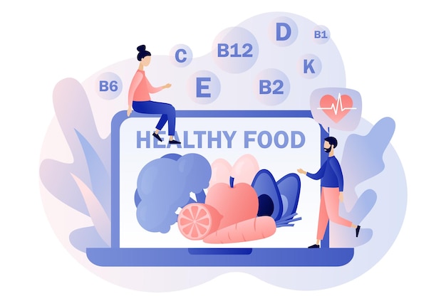 Текст о здоровой пище на экране ноутбука Крошечные люди потребляют здоровую органическую пищу с витаминами