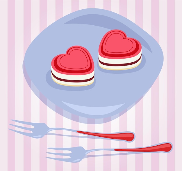 Heart shaped cakes with forks on a table