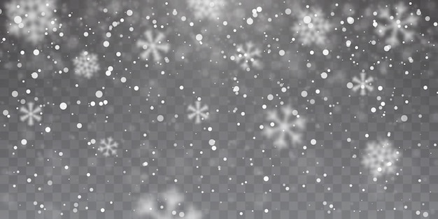 Сильный снегопад. Падающие снежинки на прозрачном фоне. Белые снежинки летают в воздухе.
