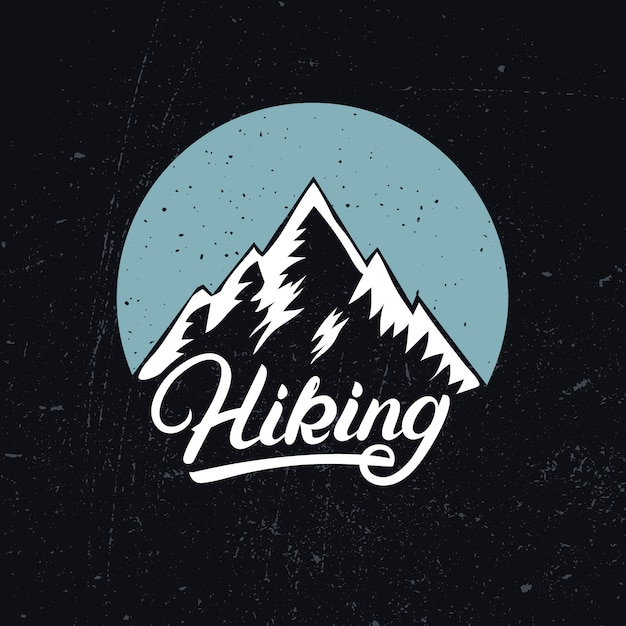 Vector hiking hand written lettering with mountain