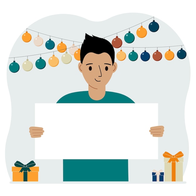 Holiday concept with garland gift boxes and poster A man smiles rejoices and celebrates a birthday a festive event a victory an achievement or a holiday