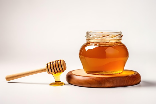 Honey bowl with dipper and flowing honey