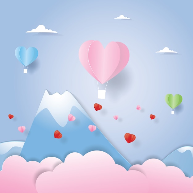 カット紙の山の上を飛んでいる熱気球