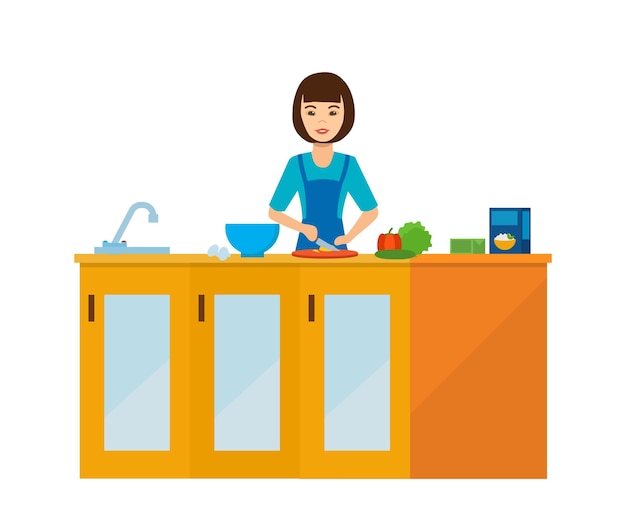 Домохозяйка на кухне за столом готовит еду