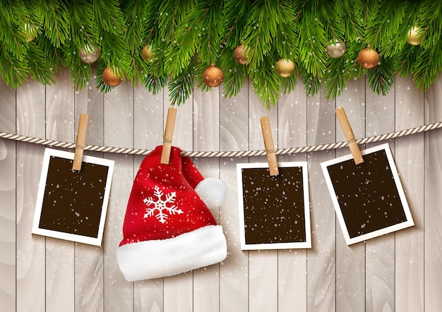 Vector Ð¡hristmas background with photos and a santa hat.